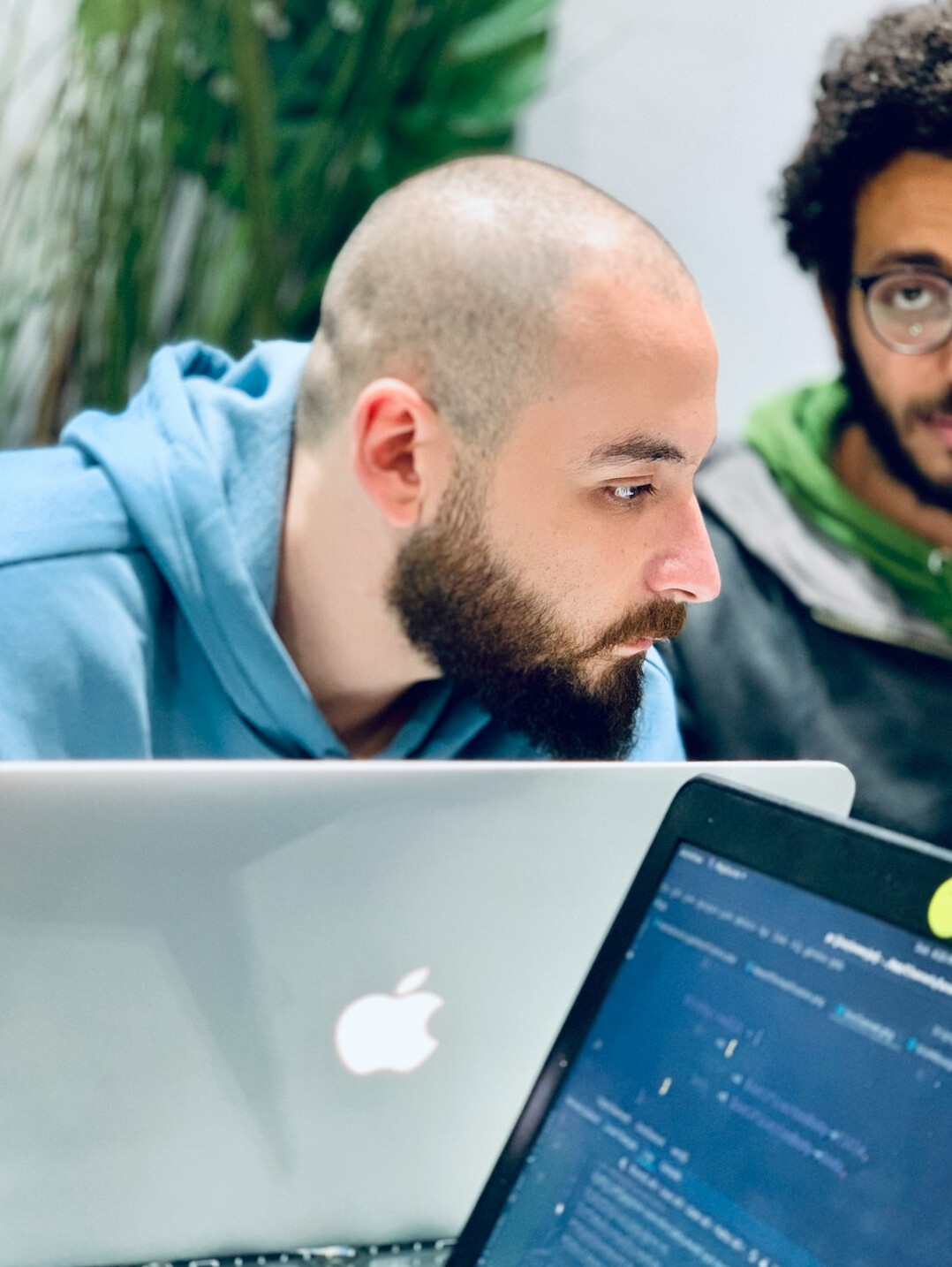 team of developers discussing code