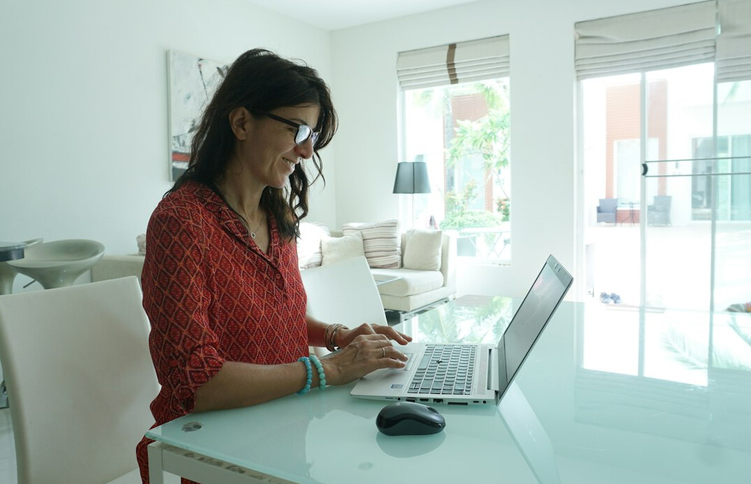 woman studying online at home